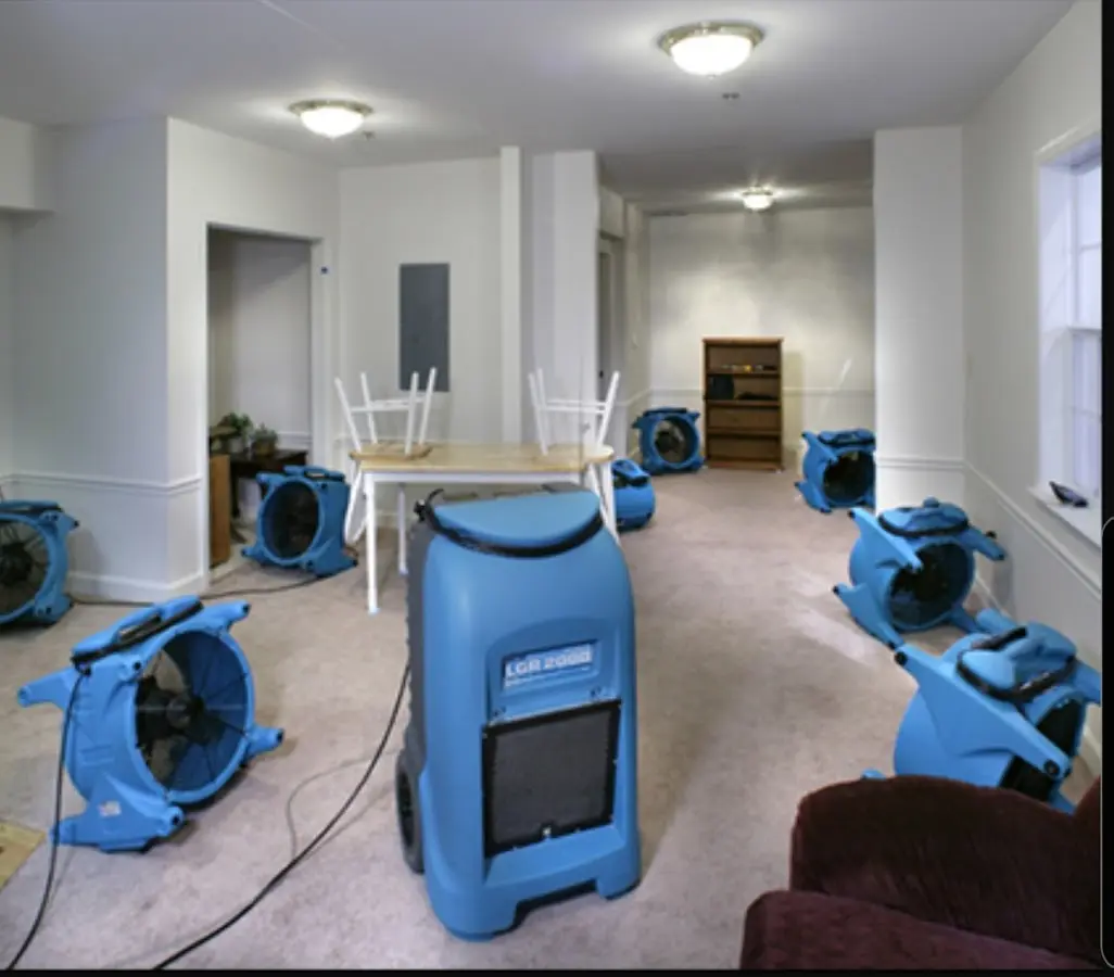Air movers and dehumidifier setup for Water Damage Restoration in Alfred